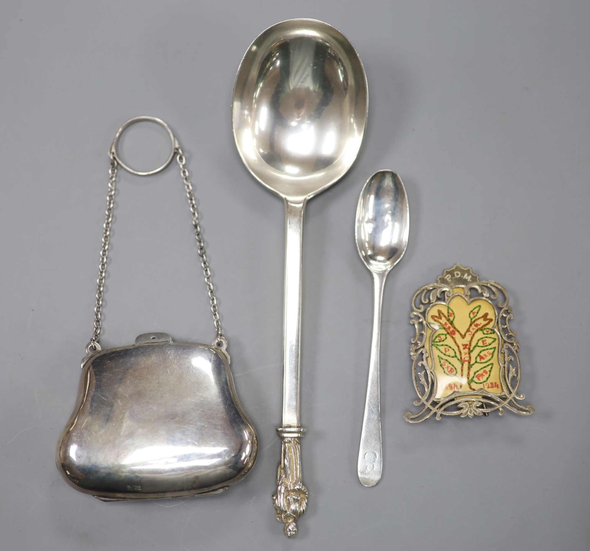 A George III Hester Bateman silver mustard spoon, 12.3cm, a George V silver apostle spoon, silver purse & photograph frame.